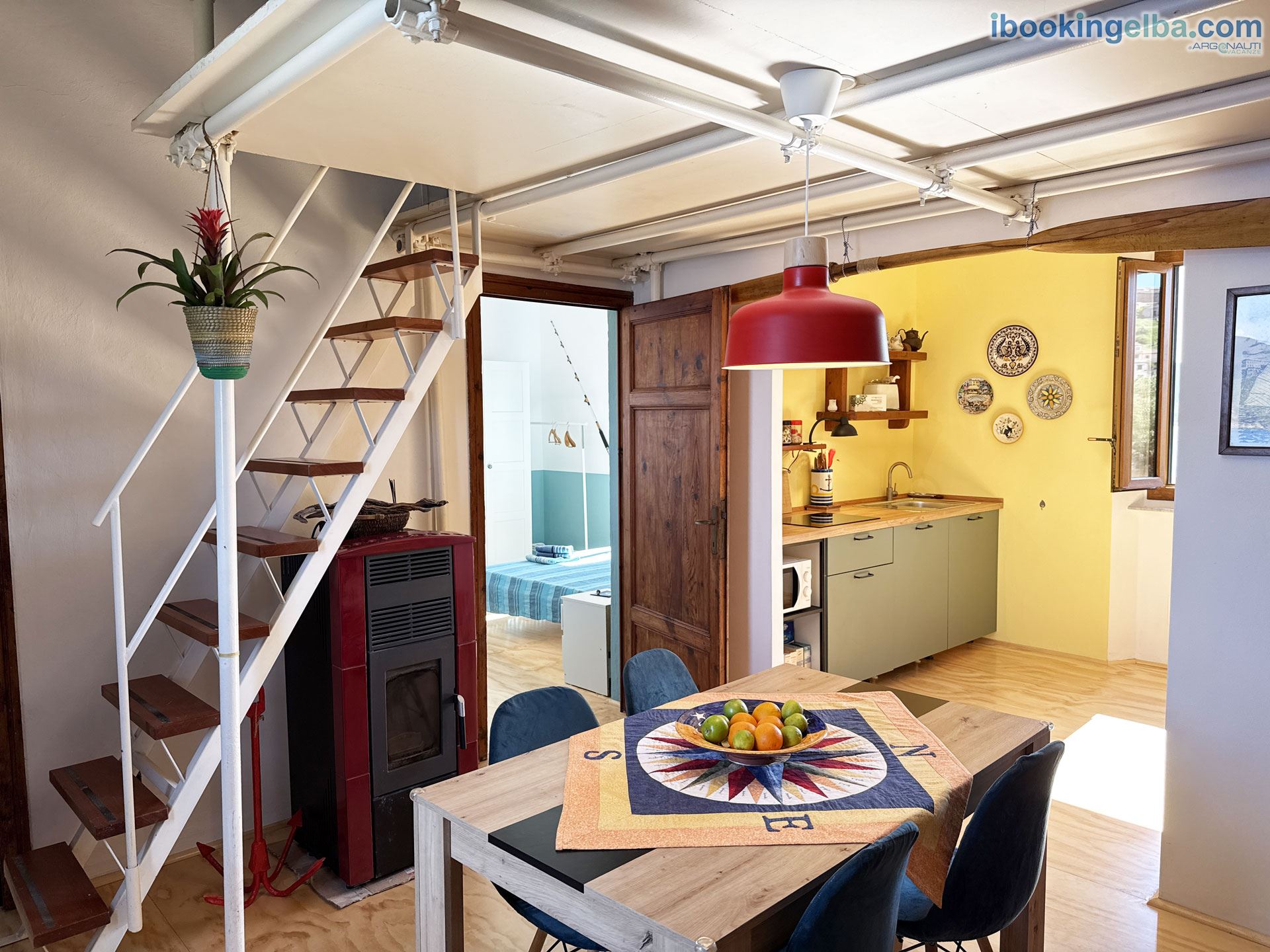 Angoli del Mare - soggiorno con zona pranzo e cucina a vista