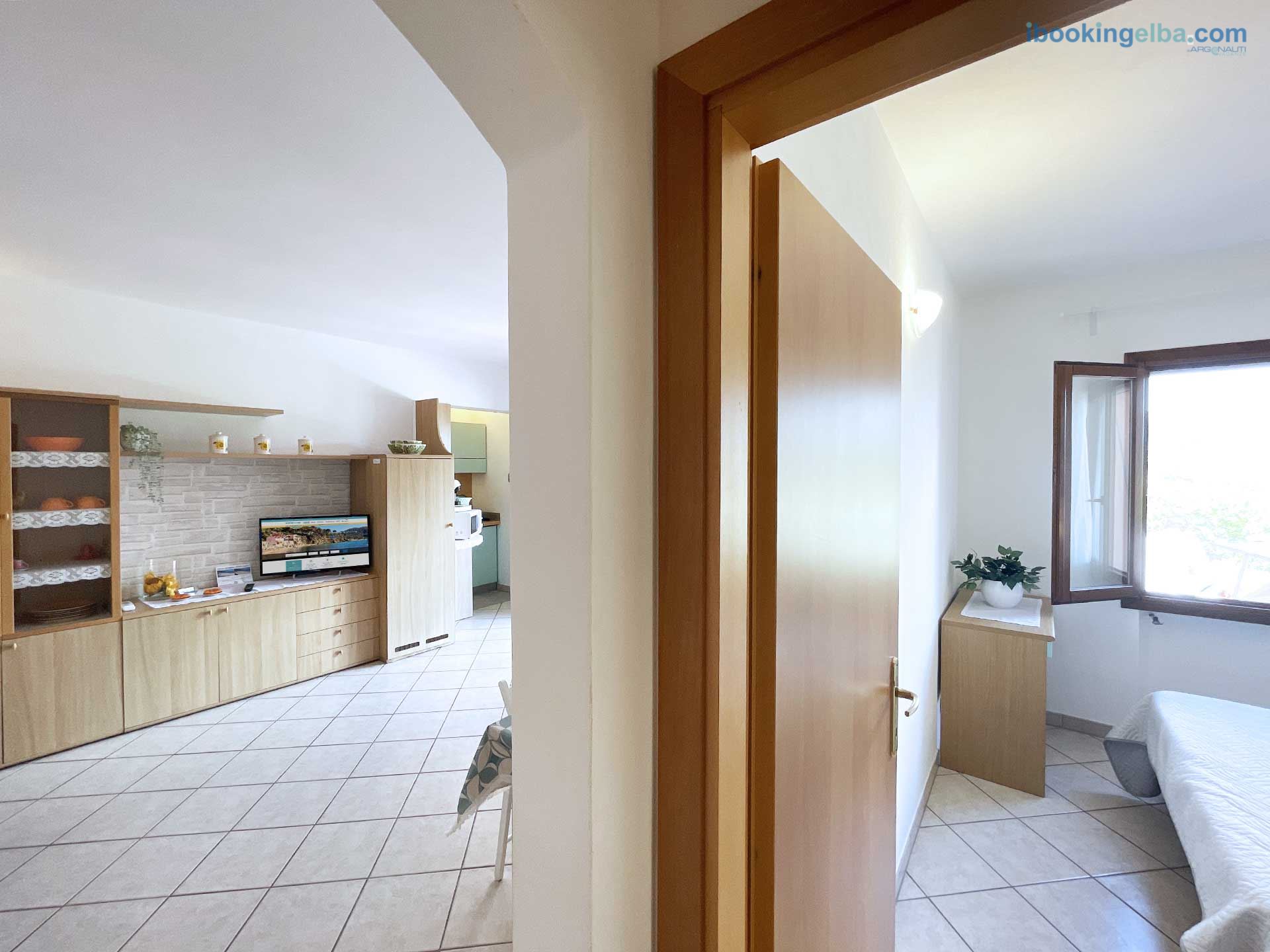 Casa Capo Perla - Soggiorno e Camera matrimoniale