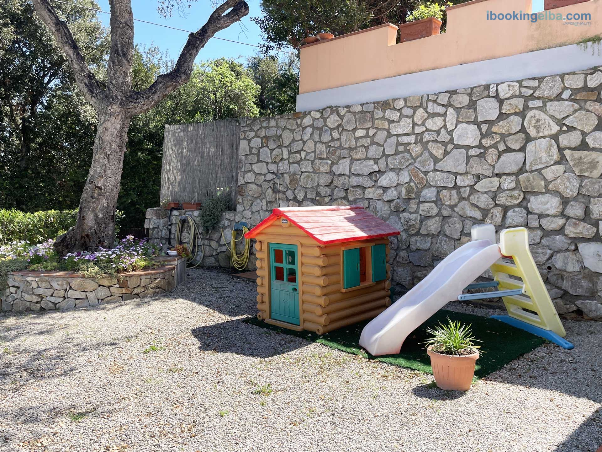 Casa Capo Perla - Giardino con Giochi per Bambini