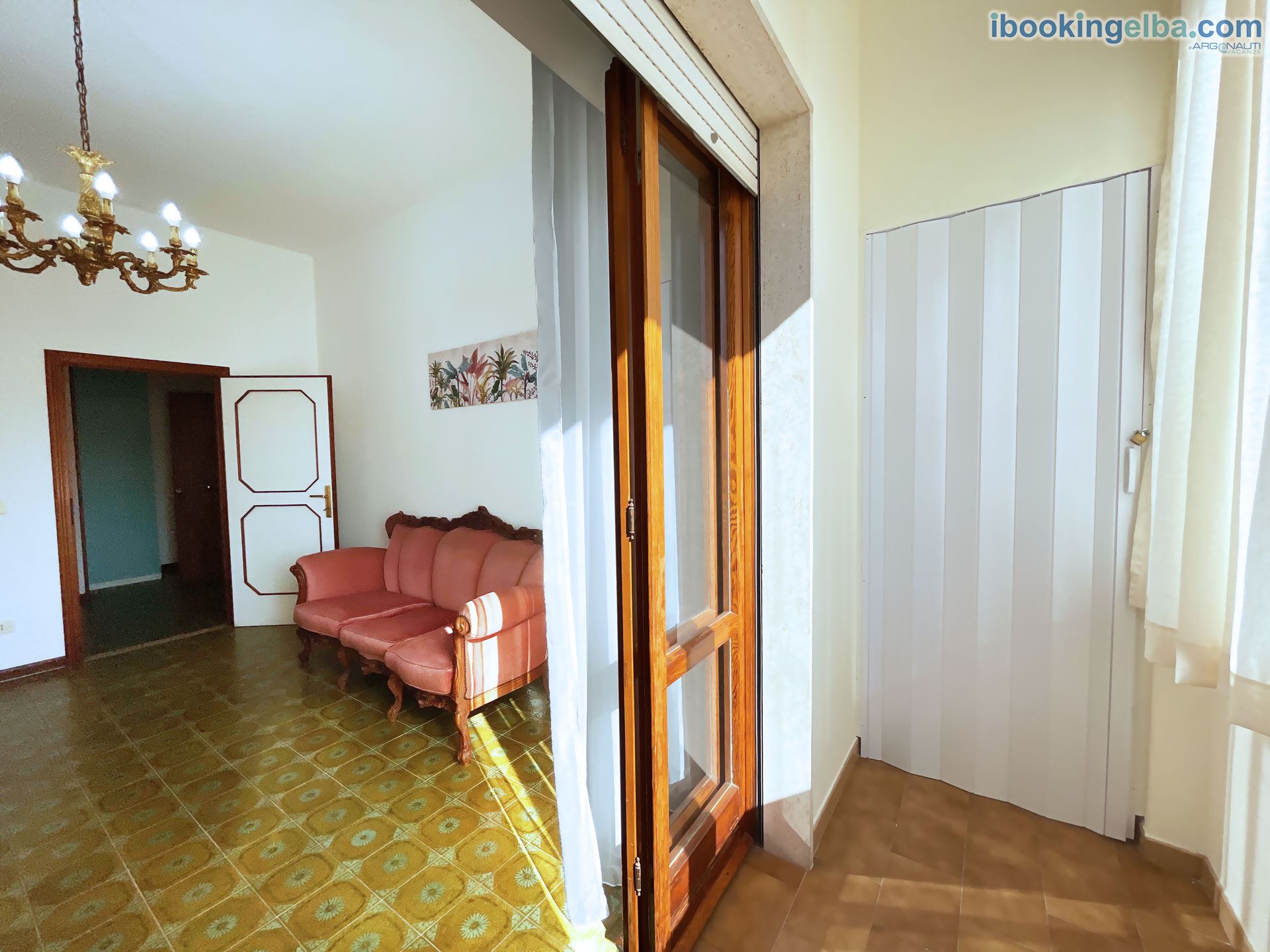 Casa Chiara - Salotto con TV e zona relax