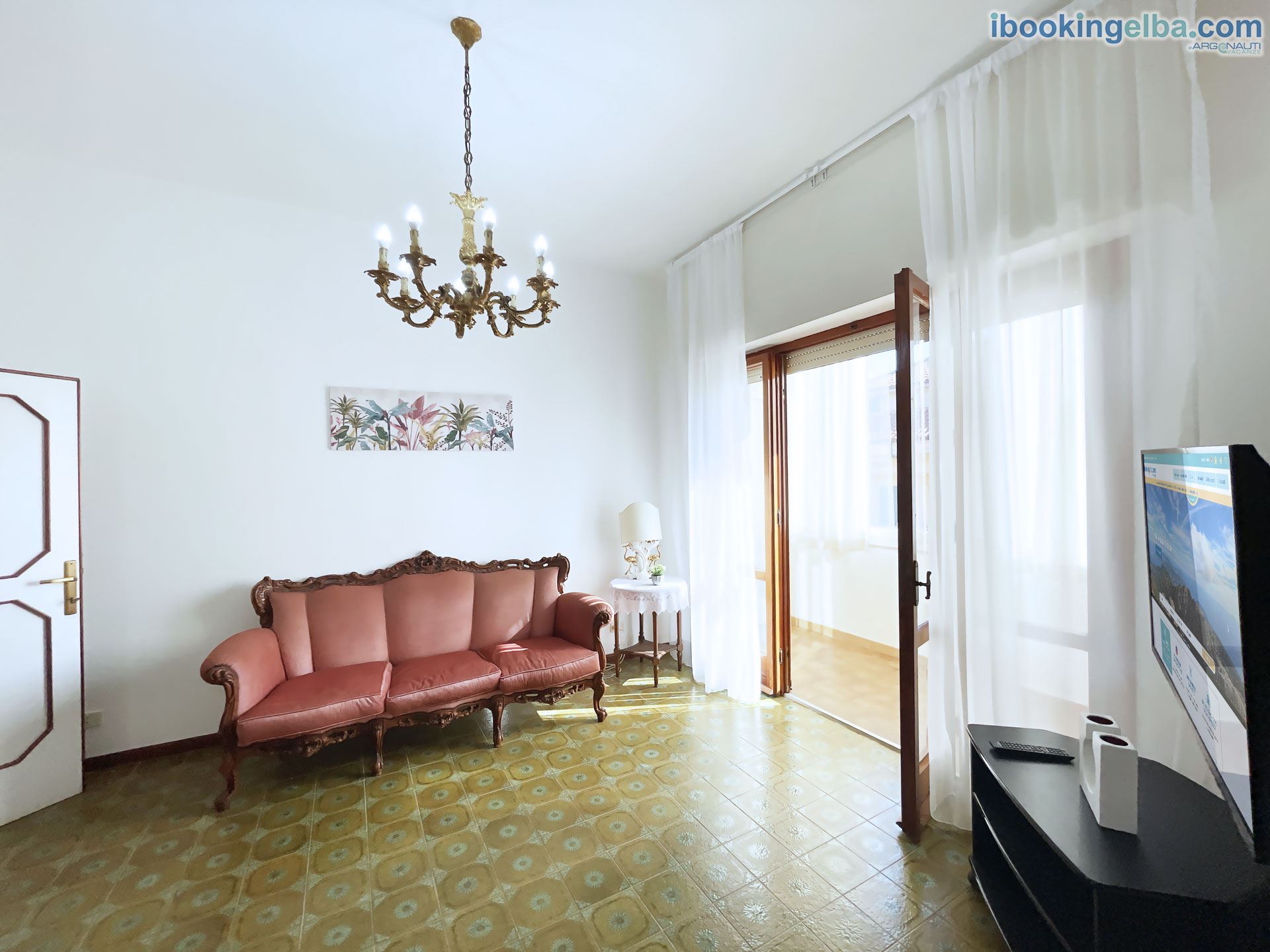 Casa Chiara - Salotto con TV e zona relax