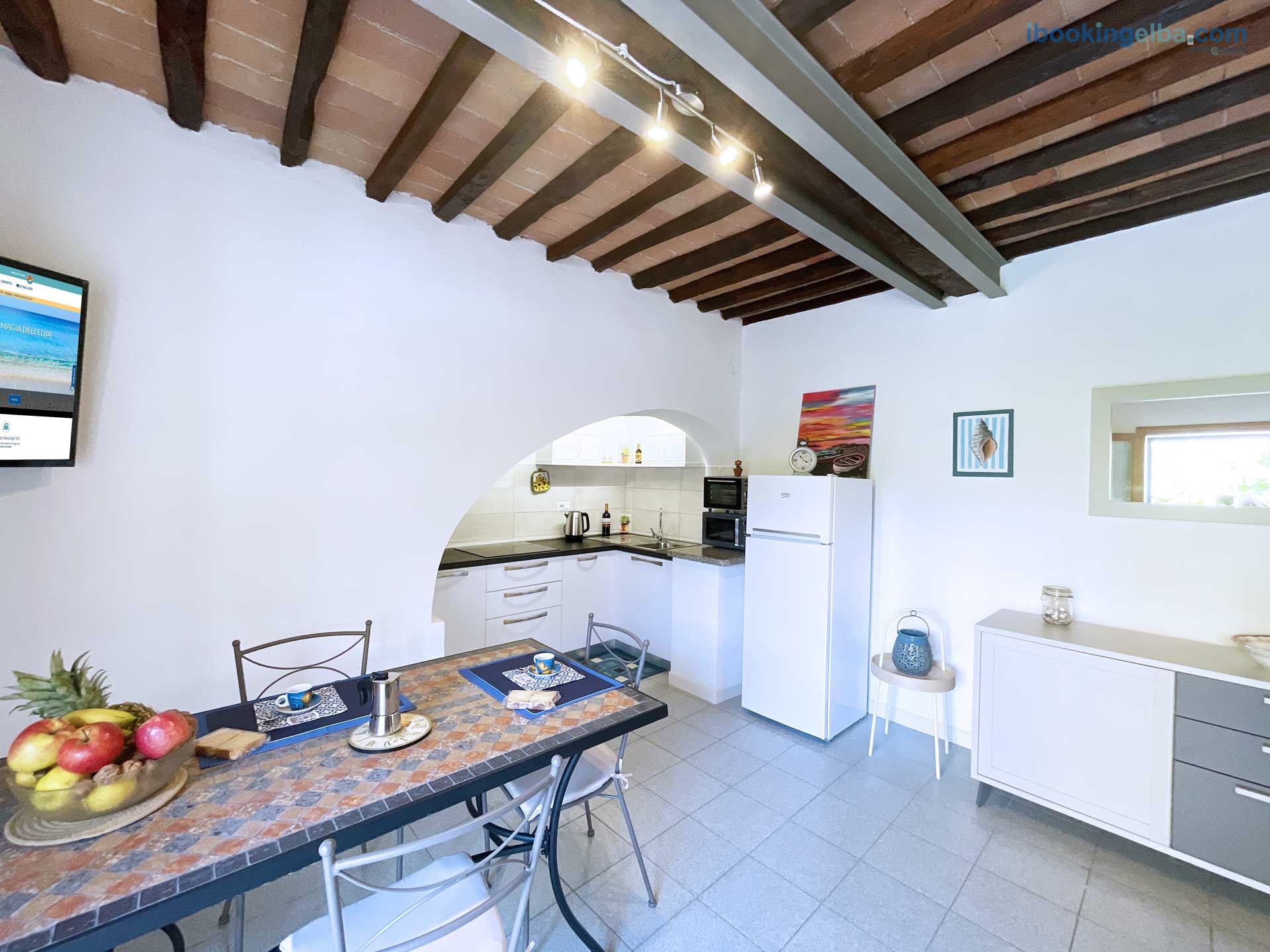 Casa Eva - Soggiorno con Divano Letto e Angolo Cottura