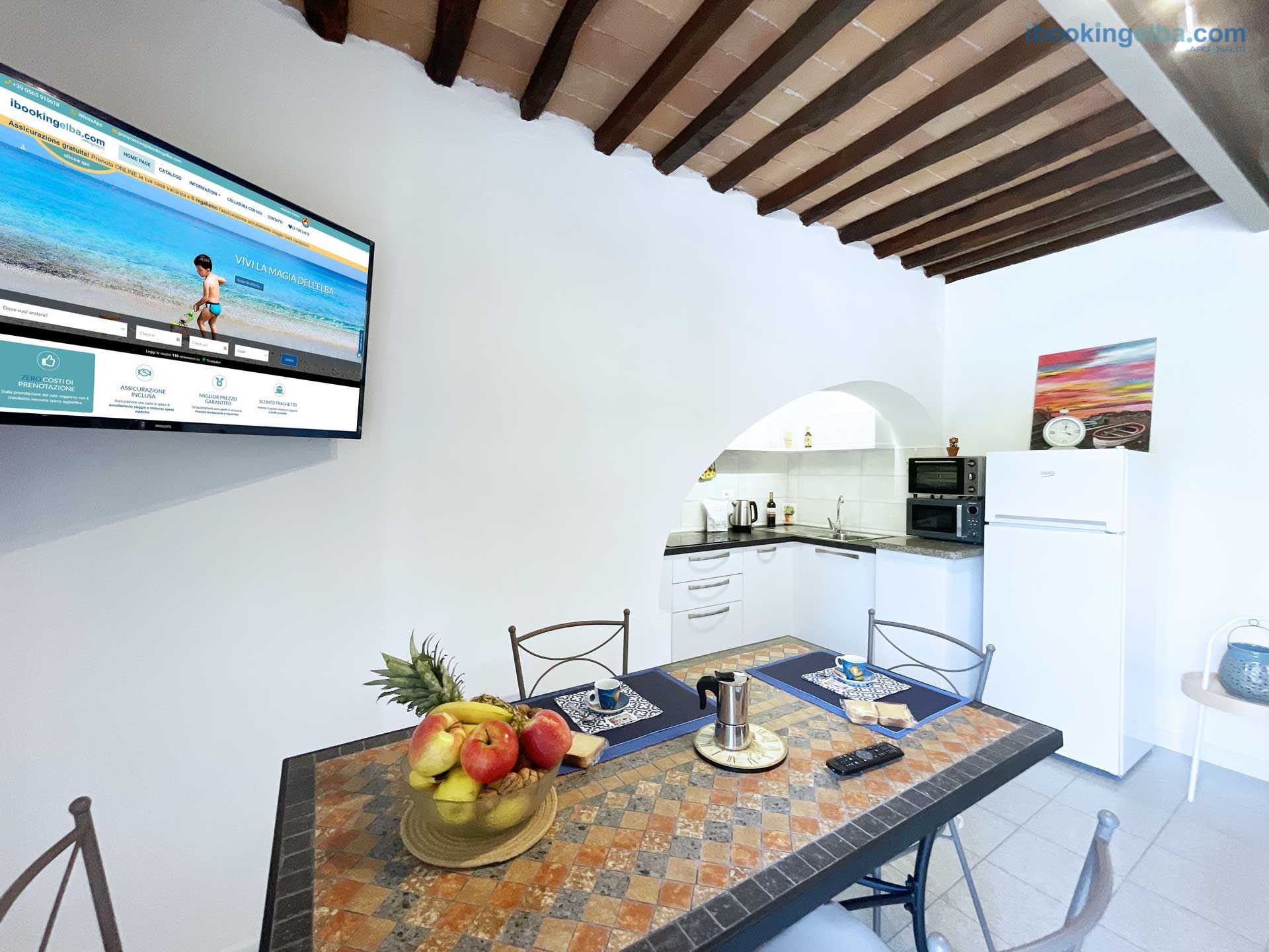 Casa Eva - Soggiorno con Zona TV e Angolo Cottura