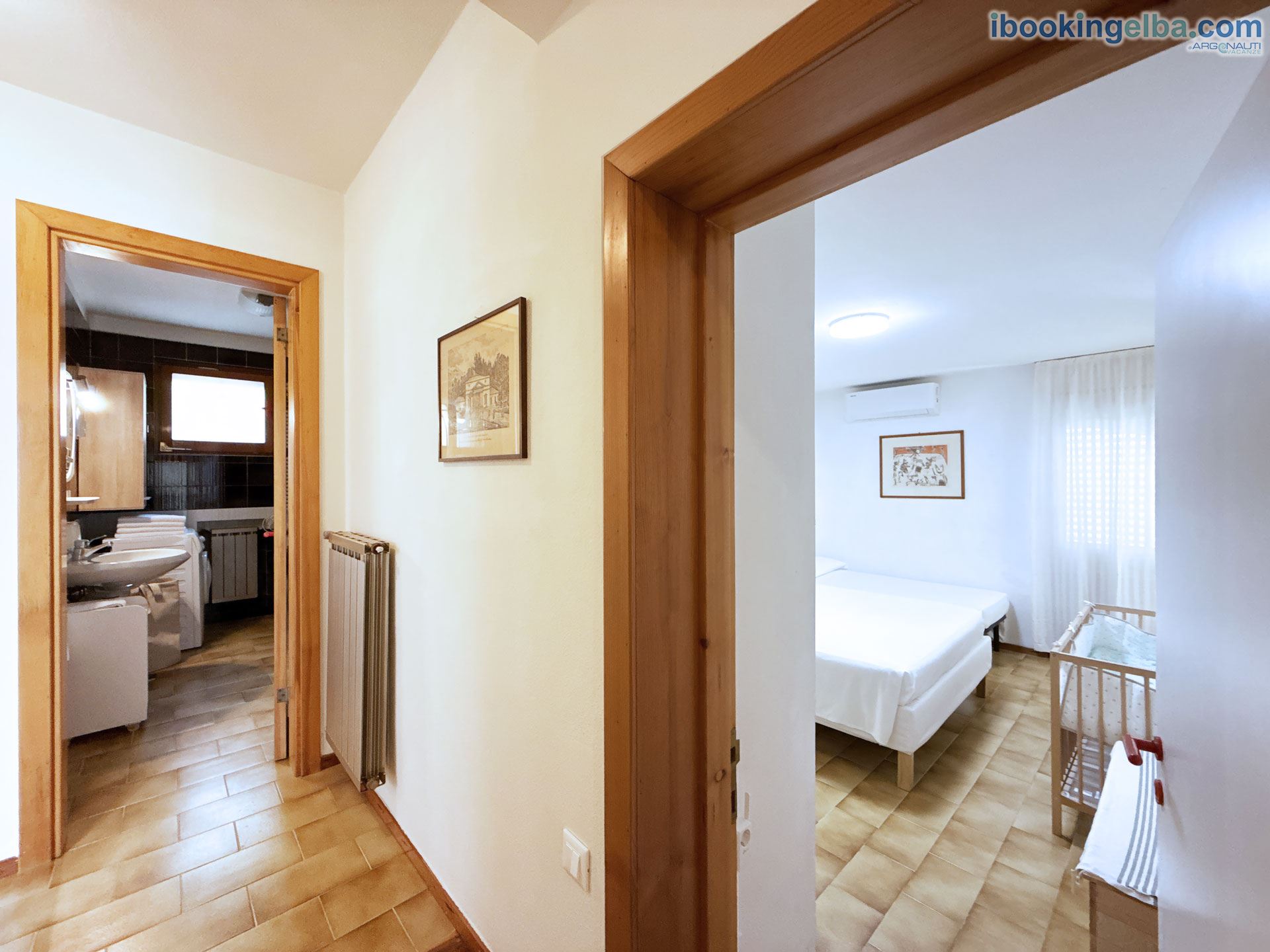 Villetta Fonza - Corridio principale: Camera matrimoniale 2 e bagno 1