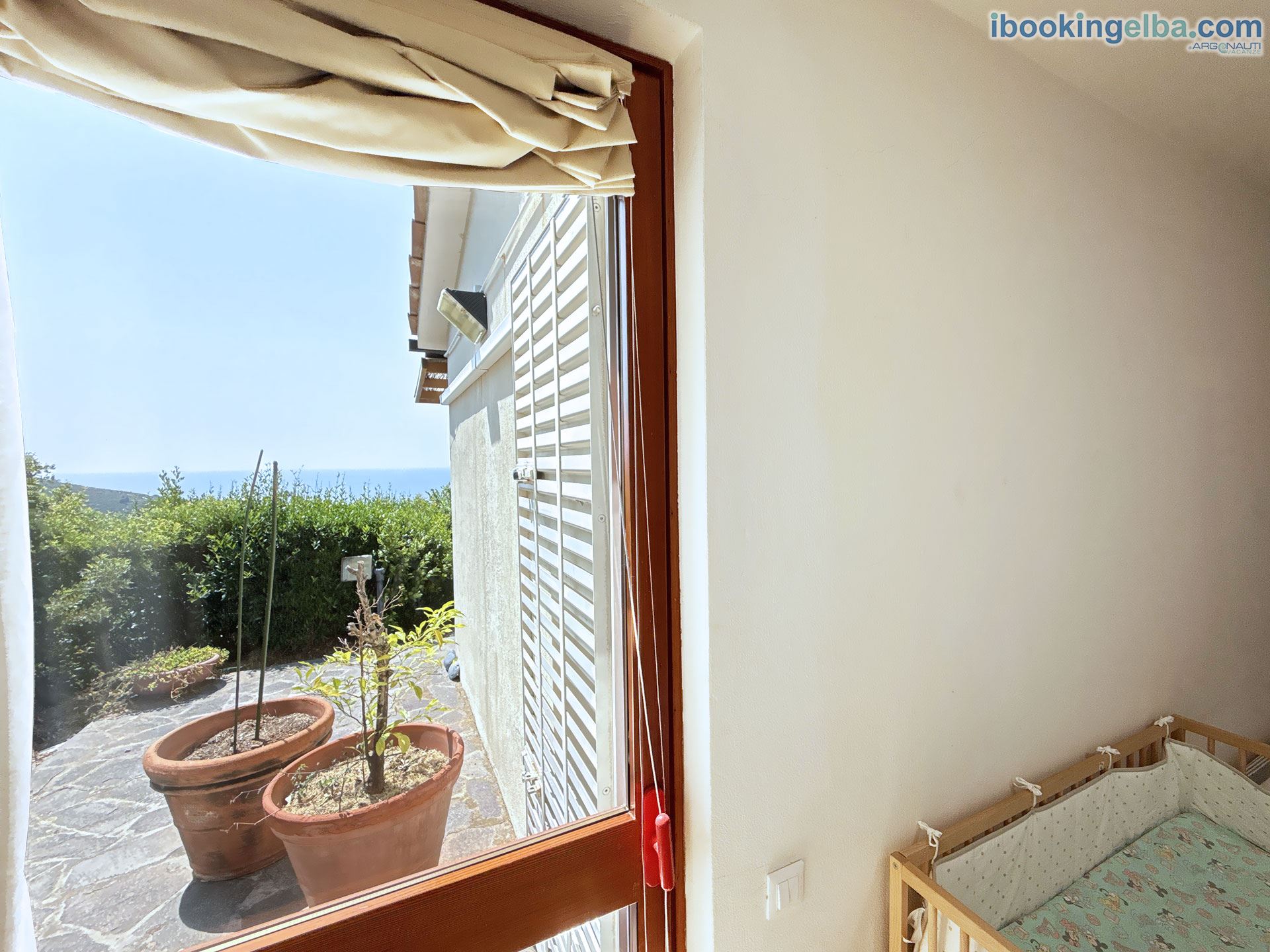 Villetta Fonza - Camera matrimoniale 2 con culla e terzo letto aggiunto e vista mare