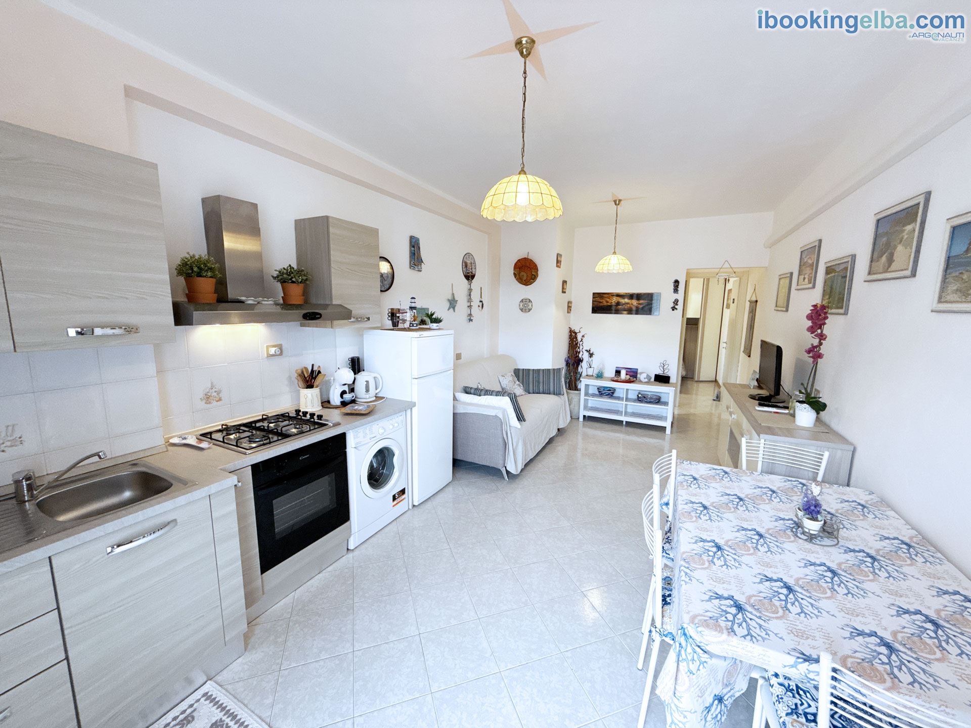 Home Camy - Soggiorno con angolo cottura