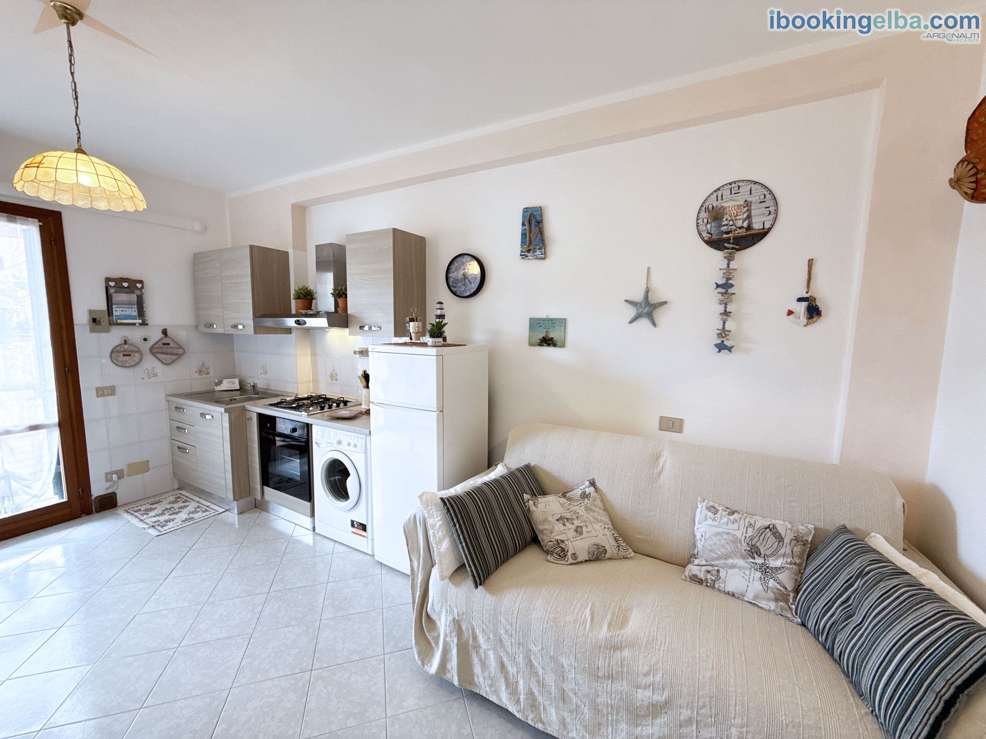 Home Camy - Soggiorno con angolo cottura