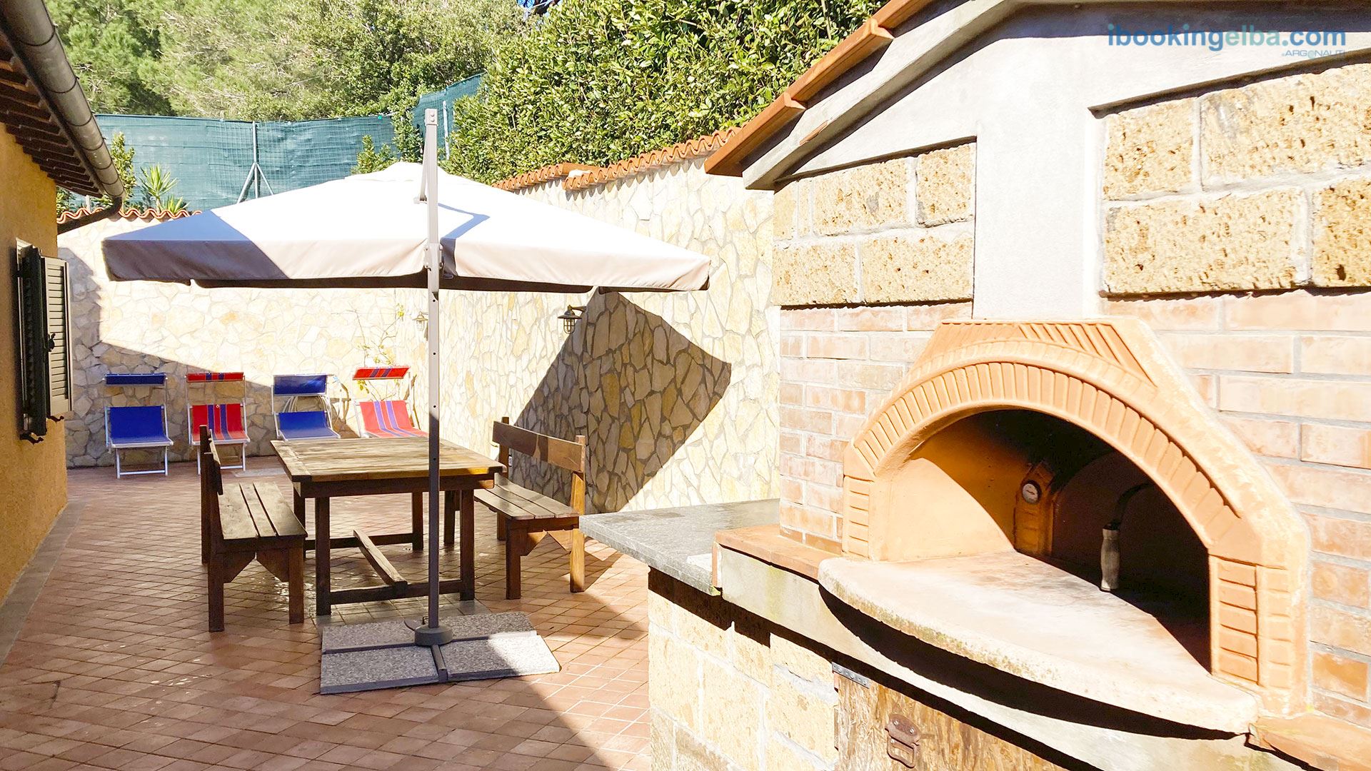 Villetta Paradiso - Spazio esterno con forno a legna e barbecue